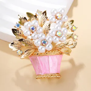 Exquisite detail view of the pearl flower basket brooch, featuring vibrant rhinestones.