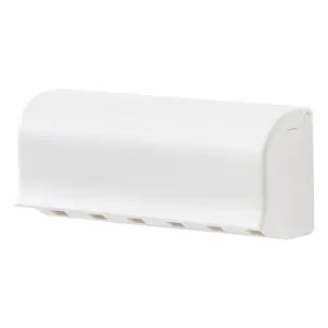 White wall-mounted toothbrush holder minimalist bathroom storage organizer for family daily use.
