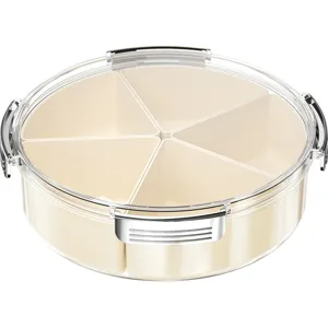 Round compartmentalized fruit tray with clear lid for home snacks and food storage.