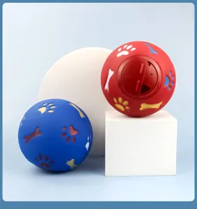 Detail view of interactive pet treat chew toys in blue and red rubber with paw cutouts.