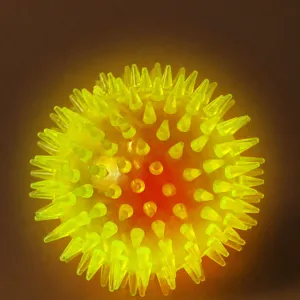 LED flashing pet spiked ball TPR dog chew toy interactive glowing pet toy for puppy.