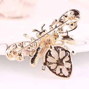 Gold-toned bee brooch with rhinestone and cat's eye stone, exquisite insect pin for women.