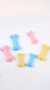Jouets à mâcher en forme d'os en TPR coloré avec des picots pour le nettoyage des dents.