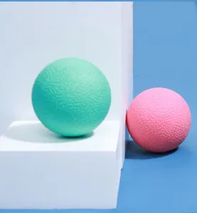 Solid rubber pet bouncy ball for dogs, textured grip design, durable interactive fetch toy.