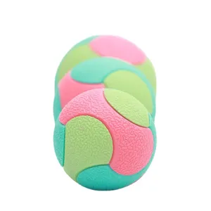 Pet toy bouncy ball for dogs, multi-color textured chew toy for medium and large dogs.