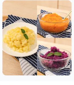 Detailed view of freshly prepared mashed potatoes and sweet potato purée in clean bowls.