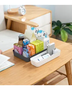 Japanese desktop storage box plastic multi-grid organizer for cosmetics and stationery.