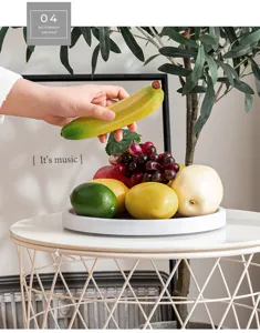Étagère de rangement rotative multifonctionnelle plateau à fruits blanc pour cuisine vue détaillée.