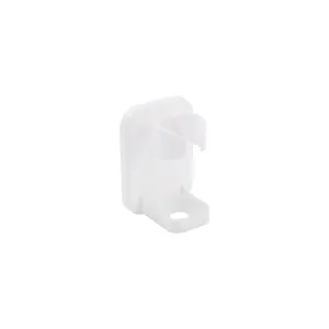 White plastic wall-mounted razor holder, punch-free bathroom electric shaver storage rack.