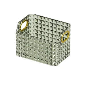 Boîte de rangement transparente à motif diamant avec poignées dorées pour bureau.