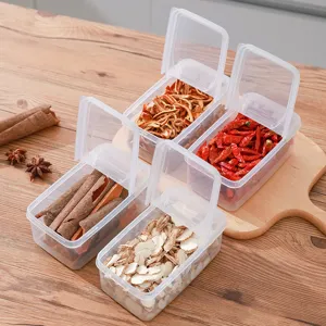 Clear plastic storage boxes with double flip lids, stackable kitchen spice and dry food containers.