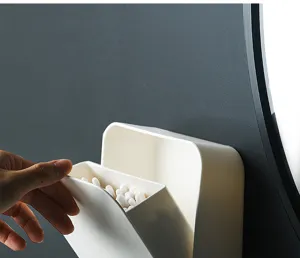 Wall mounted storage box detail showing the convenient flip open design and clean white finish.