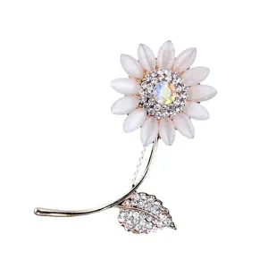 Elegante spilla a girasole con petali in pietra occhio di gatto e strass scintillanti.