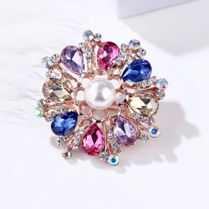 Detailed shot of a Korean-style fashion colorful crystal pearl alloy rhinestone brooch pin for women.
