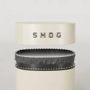 Mini desktop trash can with double layer design and hidden garbage bag for home office use.