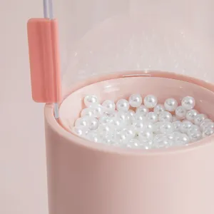 Porte-pinceau de maquillage rose avec couvercle transparent anti-poussière et boîte à perles.