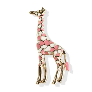 Exquisite gold-plated pink white enamel giraffe brooch detail, elegant decorative lapel pin.