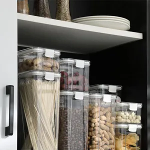 Clear plastic food storage containers with airtight white locking lids for kitchen pantry organization
