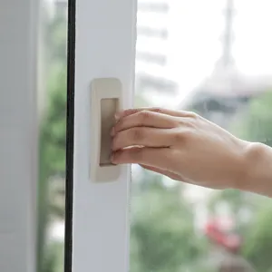 Self-adhesive auxiliary handle for sliding doors and windows, multi-purpose cabinet pull.