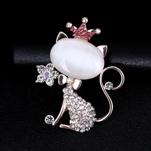 Exquisite cat eye stone and rhinestone cat brooch detailed close-up shot for elegant style.