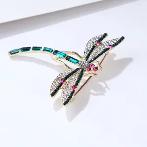 Exquisite crystal dragonfly brooch with shimmering green and pink stones, elegant alloy pin for women.