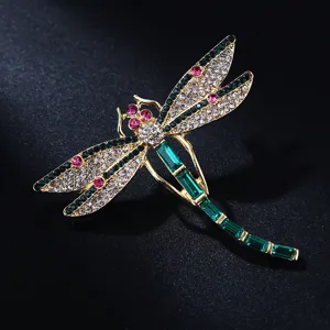 Crystal rhinestone dragonfly brooch pin for women and men, elegant fashion coat accessory.