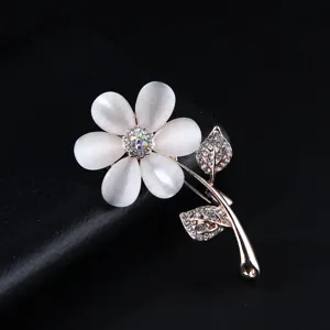 Elegant cat eye stone flower brooch with dazzling rhinestones, perfect for sweet daily outfits.