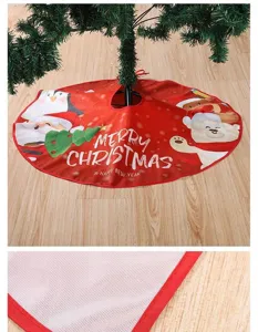 Close-up detail of red Christmas tree skirt fabric texture and festive printed holiday patterns.