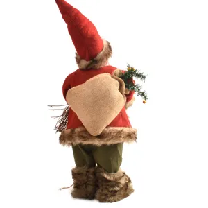 Weihnachtsmann Plüschpuppe Ornament mit Jutesack Detail, festliche Feiertagsdekoration.