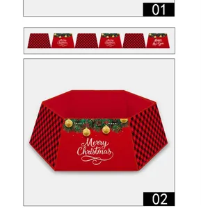 Christmas tree skirt detail showing red black plaid fabric and festive holiday print.