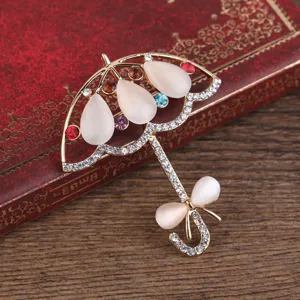 Exquisite rhinestone umbrella brooch with opal teardrop stones, vintage alloy fashion accessory.