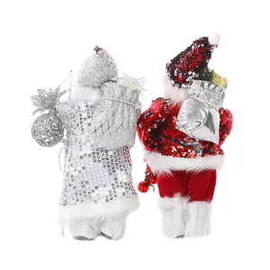 Close up of sequin Santa Claus dolls with gift bags, sparkling holiday festive decor details.