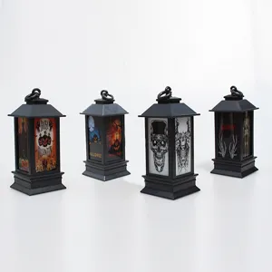 Mini lanterna decorativa portatile di Halloween con motivi spettrali di zucca e teschio.