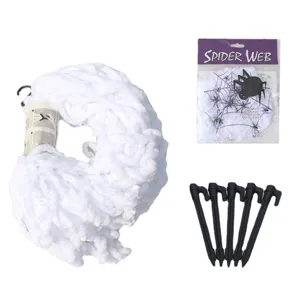 Halloween white plush spider web set with ground stakes and packaging for party decor.