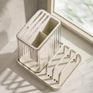 Multi-functional kitchen knife and cutting board storage rack with drain tray for home use.