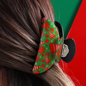 Festliche Weihnachts-Haarklammer mit grünem und rotem Feiertagsmuster für schöne Frisuren.
