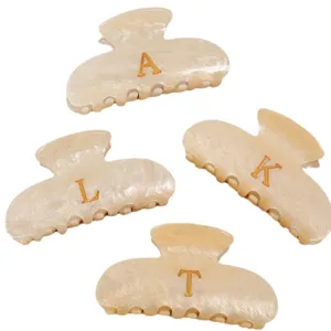 Französische goldene Buchstaben Acetat Haarklammer, elegante Haifischklammer für Damen.