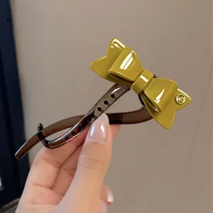 Elegante pinza de pelo con lazo de acetato para mujer, pasador twist elegante para recogidos chic.
