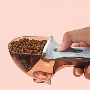 Pet food measuring spoon with adjustable scraper and clear volume scale for accurate feeding.