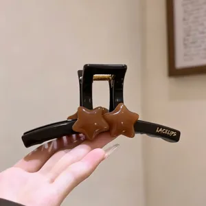 Schwarze und karamellfarbene Stern Haarspange, große elegante Haarklammer für dickes Haar.