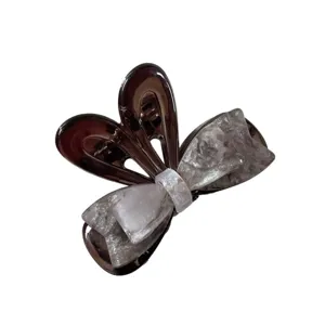 Elegant brown bow hair claw clip for women, perfect for half updo and fine hair styling.