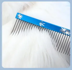Detail shot of pet grooming comb metal teeth on white fluffy fur for daily pet hair care cleaning