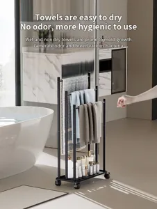Modern black metal floor standing towel rack with multi tiers and wheels for bathroom organization.