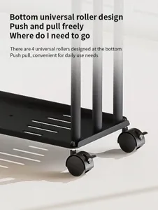 Detail view of the black metal floor standing towel rack with bottom universal rollers.