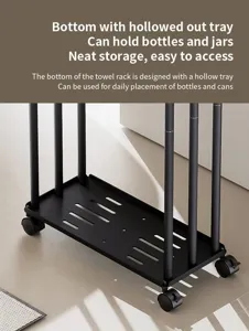 Floor standing towel rack with hollow tray and wheels for bathroom storage and neat organization.