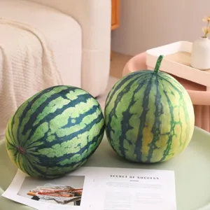 Close-up detail of simulation watermelon plush pillows on a cozy coffee table, cute home decor.