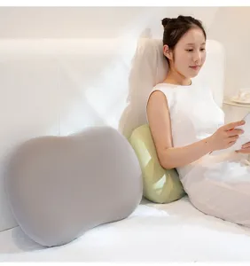 Ergonomic memory foam lumbar pillow for bed and office use, soft support cushion in elegant grey.