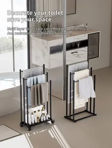 Details of black metal standing towel rack with multi layers for modern bathroom space storage.