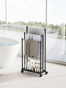 Modern freestanding metal towel rack with rolling wheels, multi-tier bathroom storage rack.