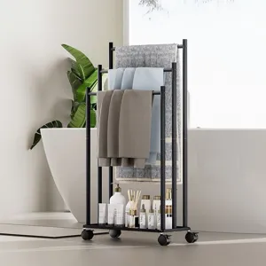 Floor standing metal towel rack with wheels, multi-tier bathroom storage shelf stand.